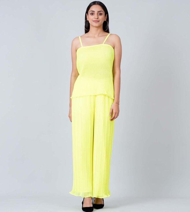 first resort by ramola bachchan neon green camisole and pleated palazzo set