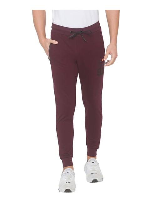 spykar wine slim fit printed jogger jeans