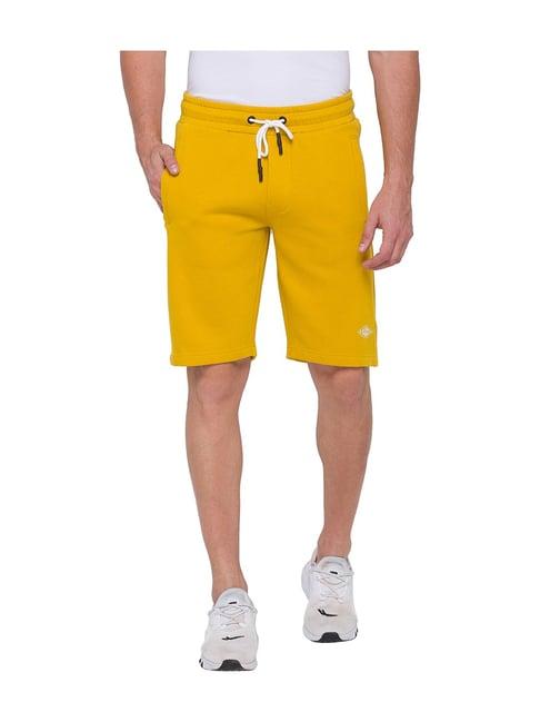 being human yellow mid rise shorts