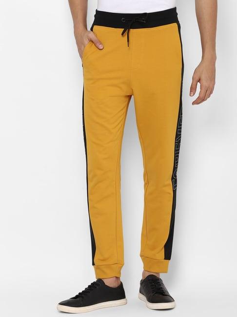 forever 21 yellow  regular fit printed joggers