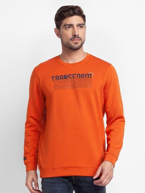 spykar orange cotton slim fit printed sweatshirt