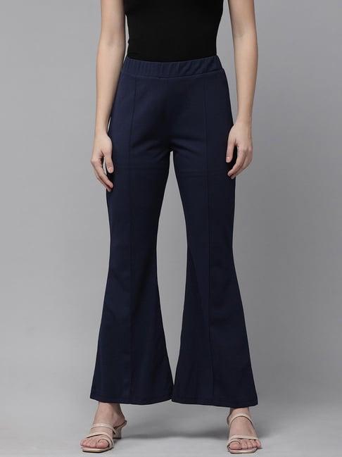 rare navy mid rise flared fit trousers