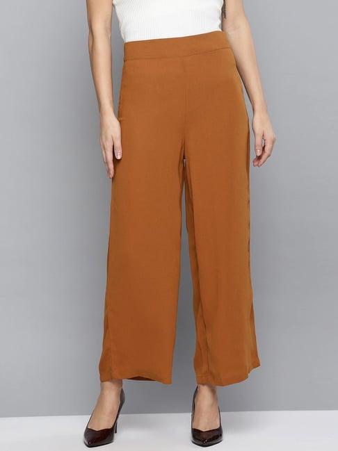 rare tan high rise trousers