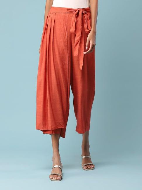 aarke ritu kumar rust mid rise relaxed fit cropped pants