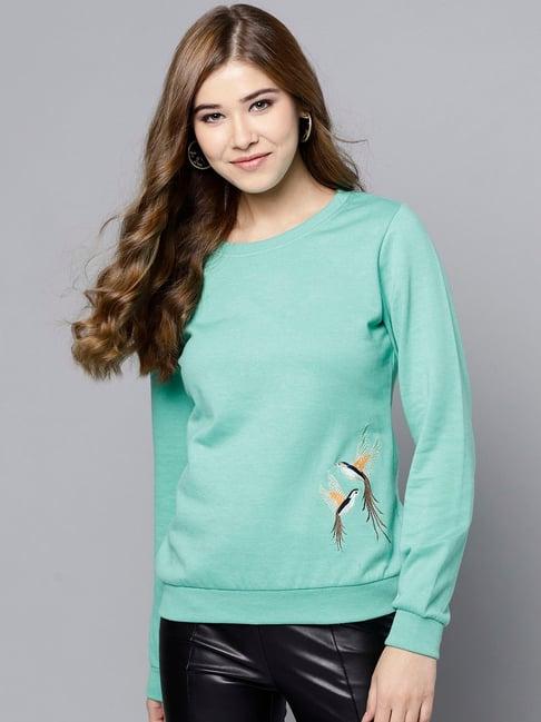 rare turquoise embroidered pullover