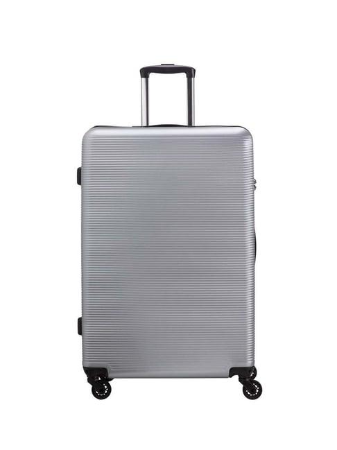 carpisa silver rigid space go large checked luggage