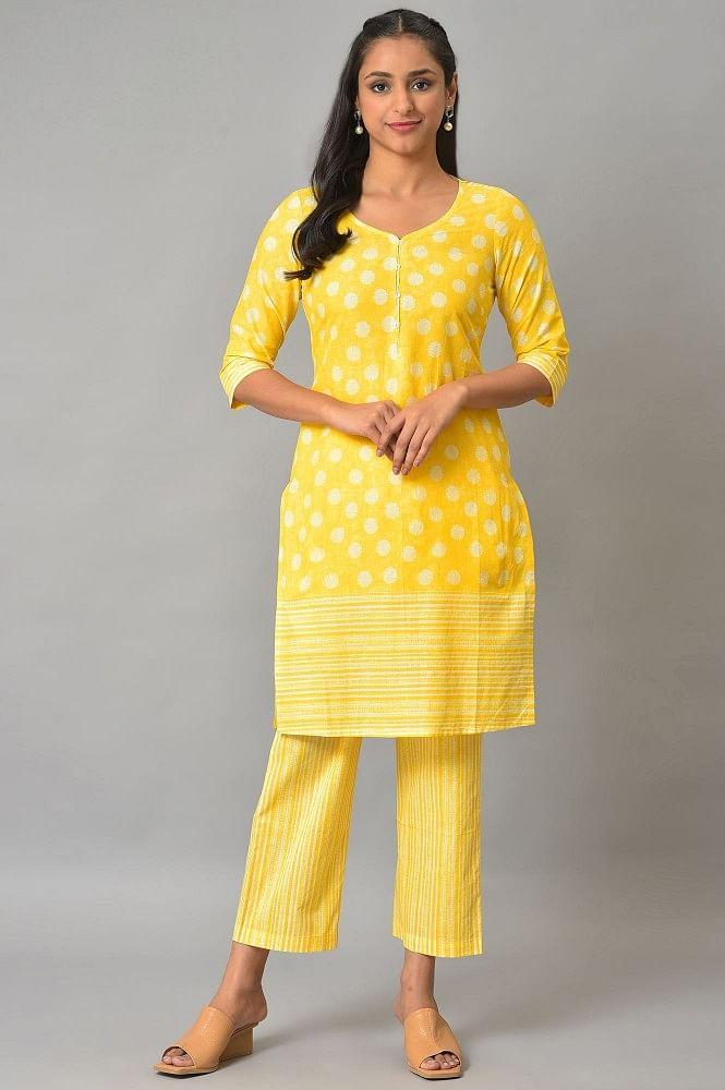 yellow polka dots printed cotton kurta with narrow palaza