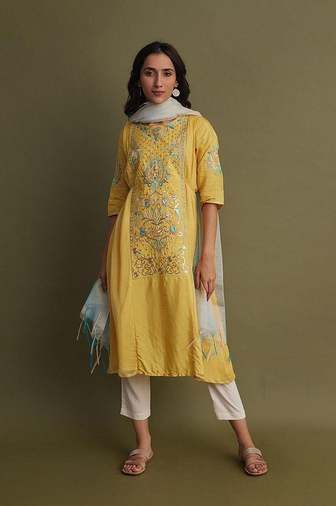 yellow embroidered kurta with natural trousers and dupatta