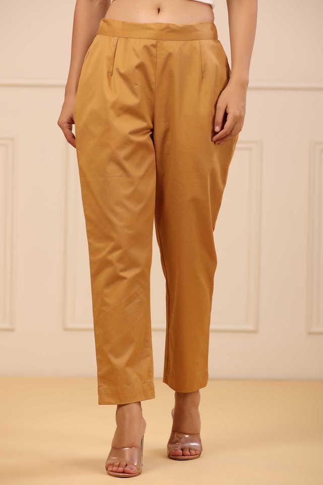 gold solid slim fit cotton pants with partially elasticated waistband.