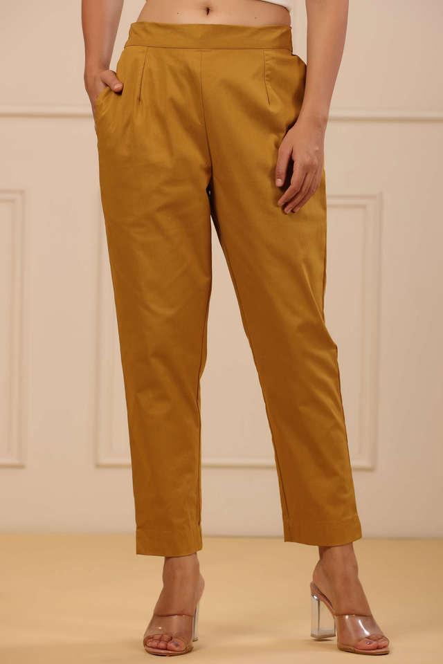 mustard spendex solid slim fit pants with partially elasticated waistband