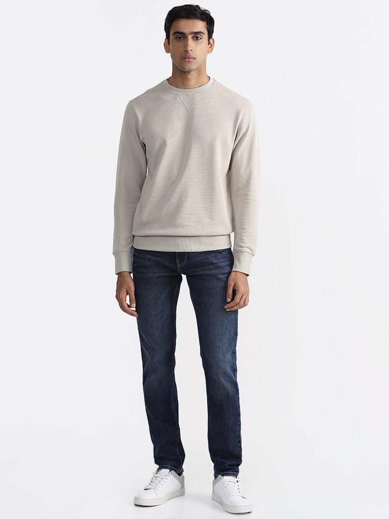 wes casuals solid beige-colored relaxed fit sweatshirt